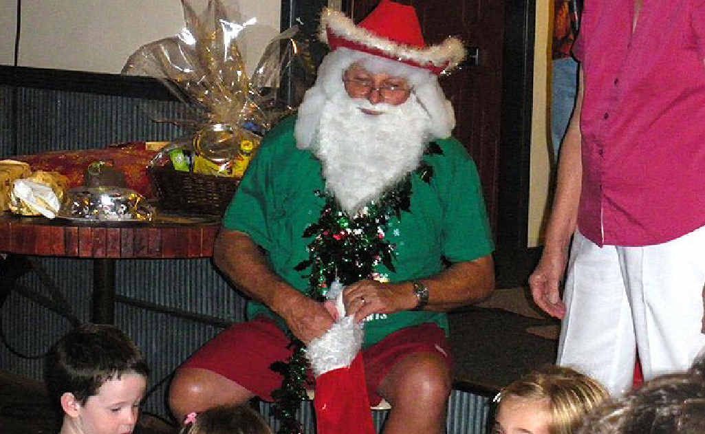 Aussie Santa was a hit with the children at the Pie Creek Hall Christmas party. Aussie Santa was a hit with the children at the Pie Creek Hall Christmas party.
